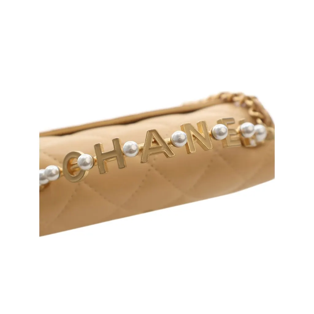 Chanel CC Quilted Lambskin Faux Pearl Top Handle Flap Beige Leather Very good - Model View