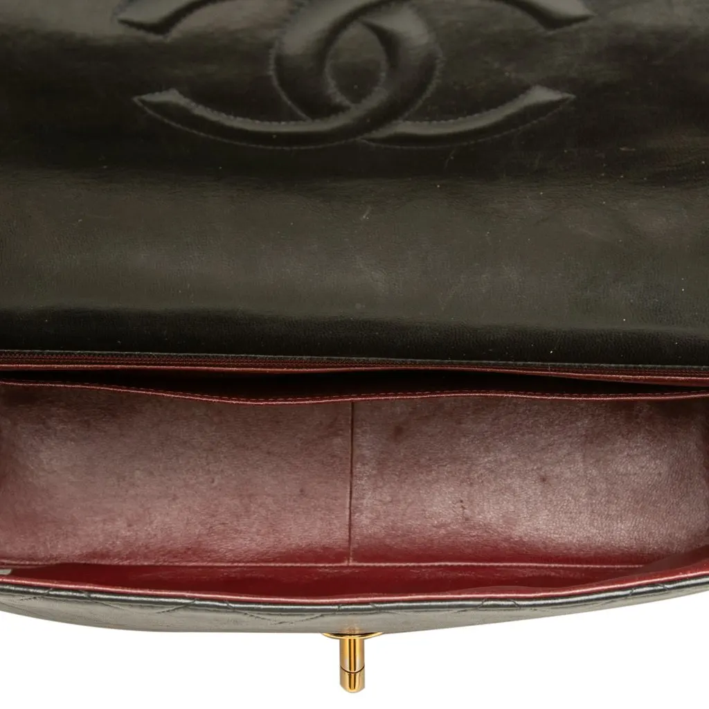 Chanel Maxi XL Classic Lambskin Single Flap Black Leather Good - Model View