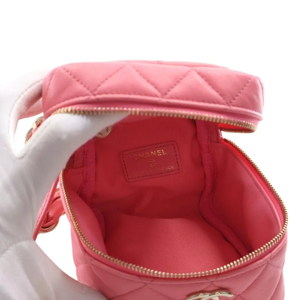 Chanel Quilted Lambskin Cube Chain Wristlet Case Pink Leather Good - Model View