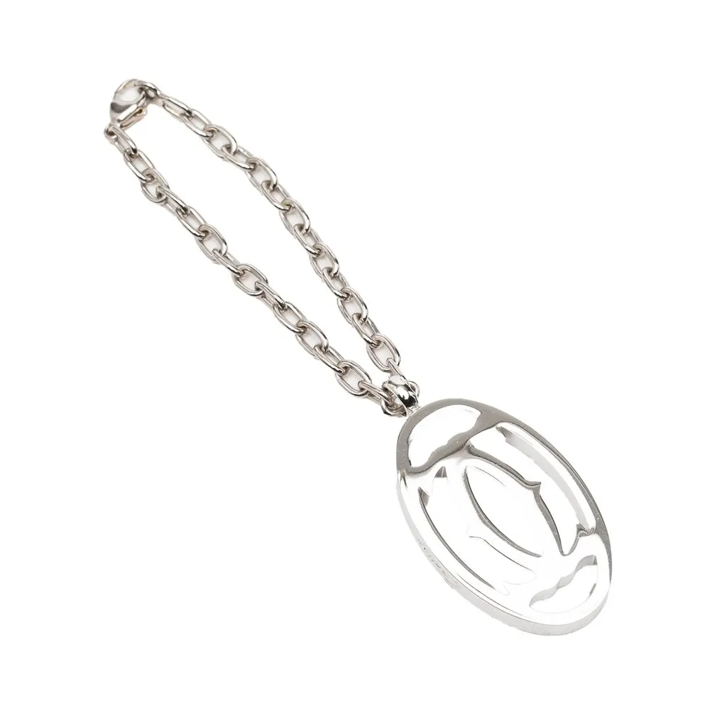 Cartier Brass Logo Bag Charm and Key Chain