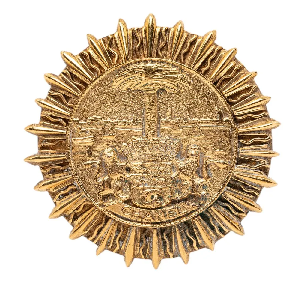 Chanel Gold Plated Coat Of Arms Medallion Sunburst Brooch Gold Metal Very good - Front View