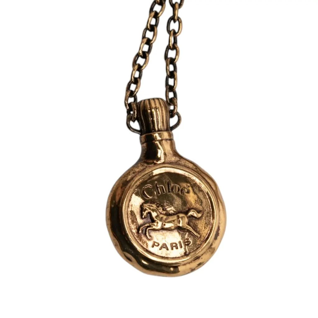 Chloé Gold Plated Chloe Symbols and Shearling Tail Bag Charm Gold Metal Never worn - Model View