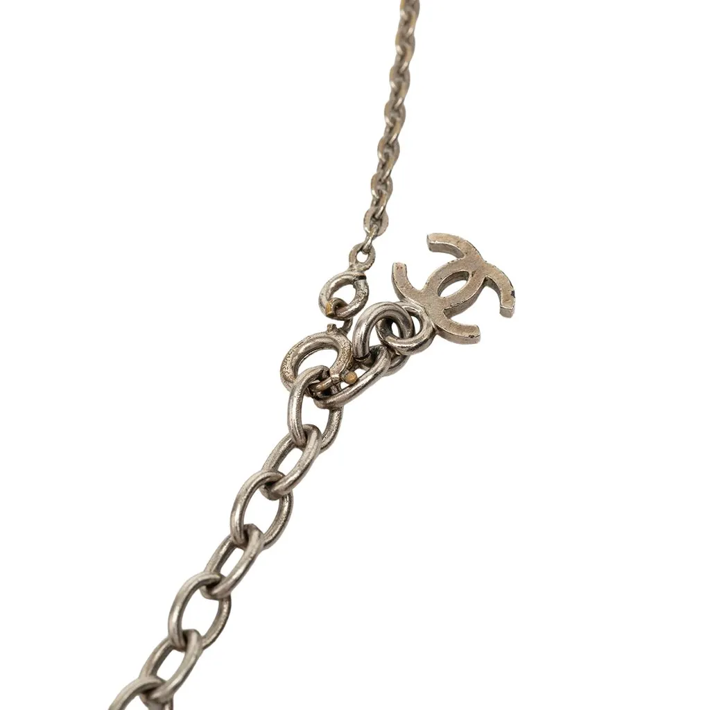 Chanel Brass and Mother of Pearl Camellia Pendant Necklace Silver Metal Very good - Model View