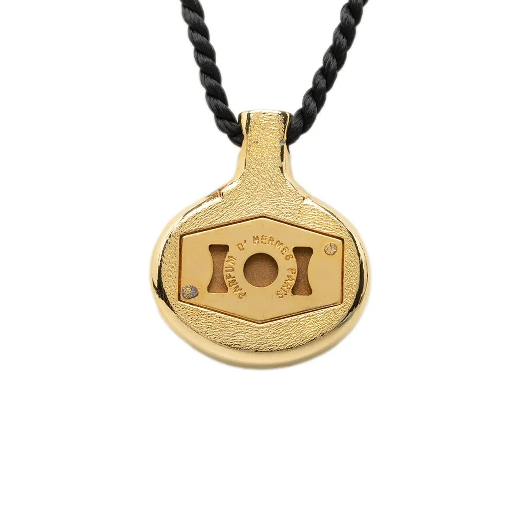 Hermès Gold Plated and Lacquered Parfum Bottle Pendant Necklace Gold Metal Good - Inside View