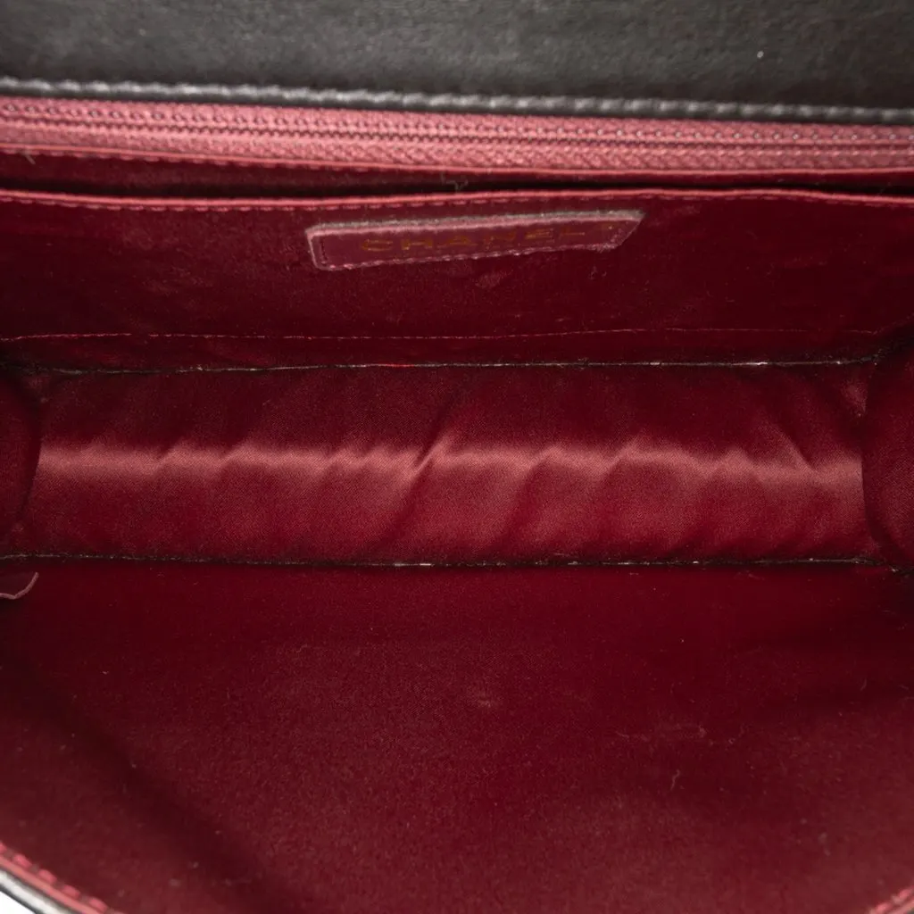 Chanel Quilted Lambskin Golden Class Flap Black Leather Good - Model View