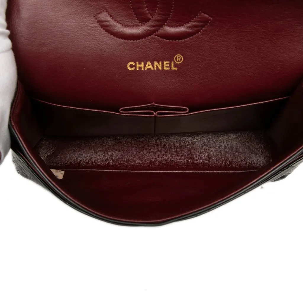 Chanel Medium Classic Lambskin Double Flap Black Leather Good - Model View