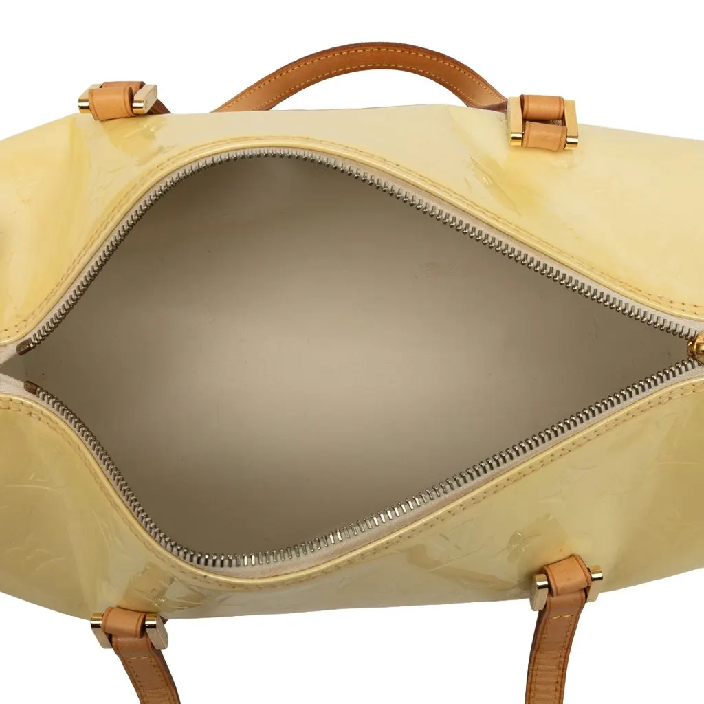 Louis Vuitton Monogram Vernis Bedford Beige Leather Good - Model View