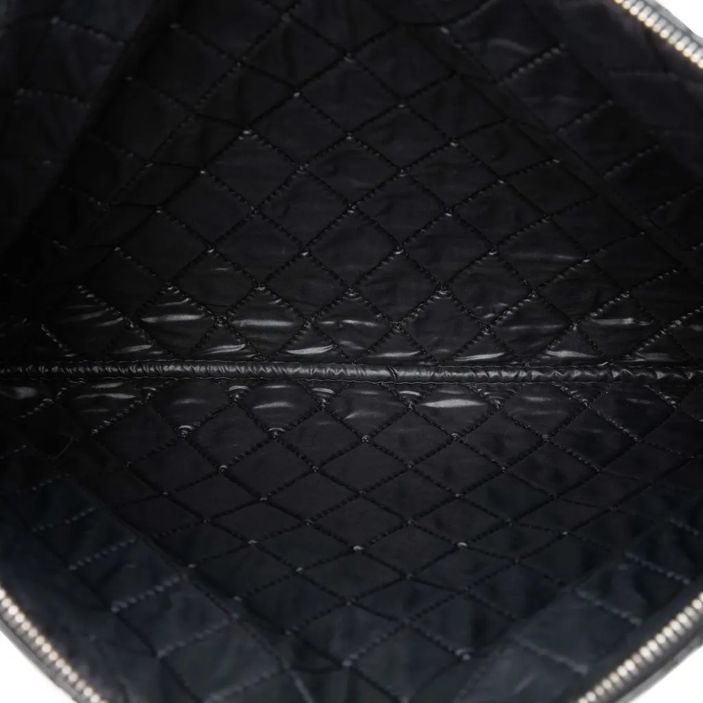 Chanel Large Quilted Patent O Case Clutch Black Leather Good - Model View