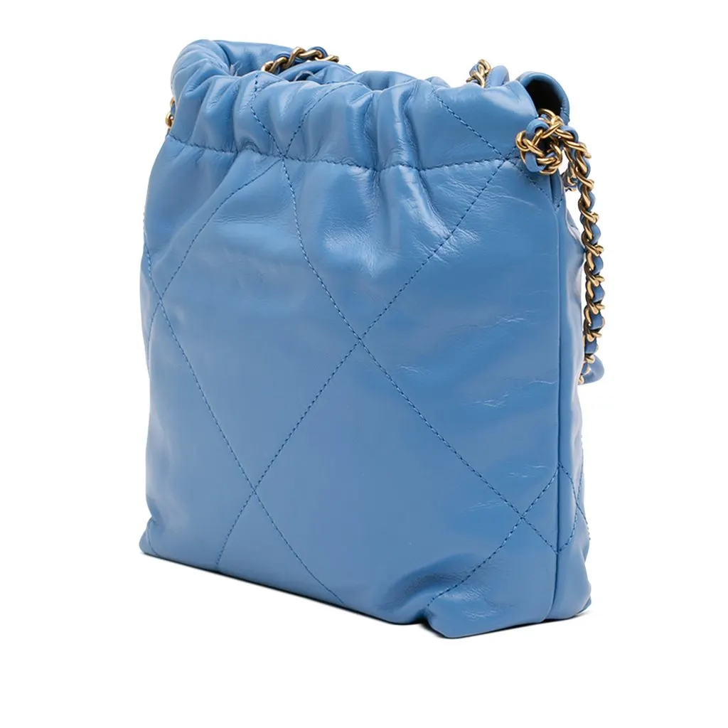 Chanel Mini Shiny Calfskin 22 Handbag Blue Leather Never worn - Back View