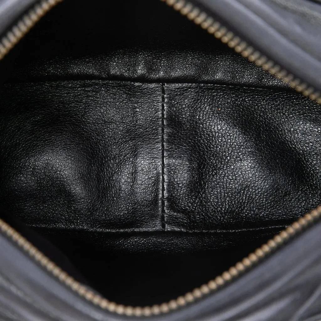 Chanel CC Quilted Lambskin Tassel Camera Bag Black Leather Very good - Model View