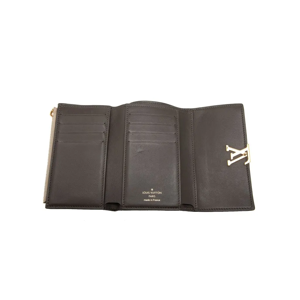 Louis Vuitton Taurillon Capucines Compact Wallet Beige Leather Very good - Model View