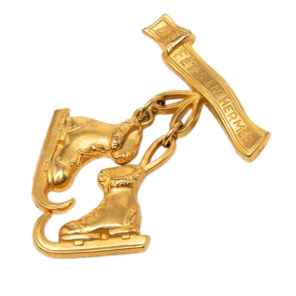 Hermès Gold Plated Les Fetes en Hermes Pin Brooch Gold Metal Very good - Front View