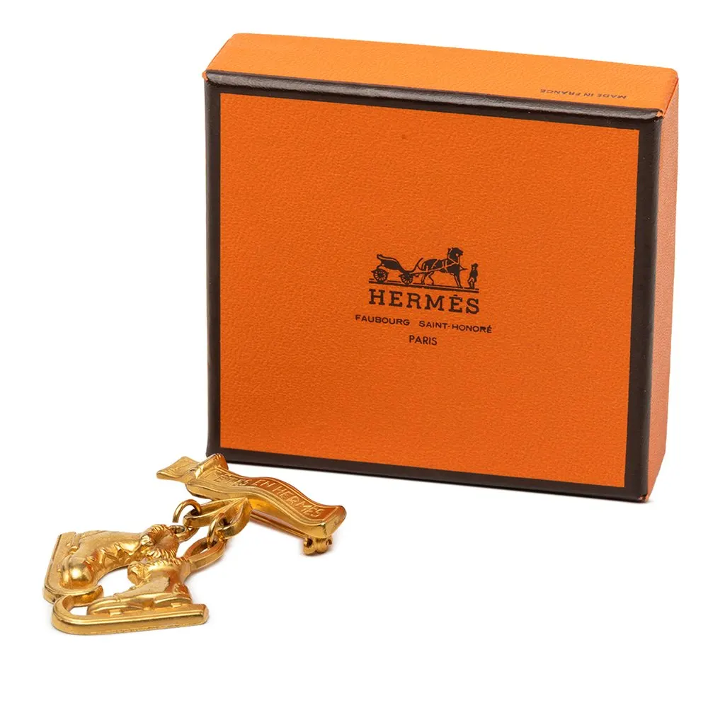 Hermès Gold Plated Les Fetes en Hermes Pin Brooch Gold Metal Very good - Model View