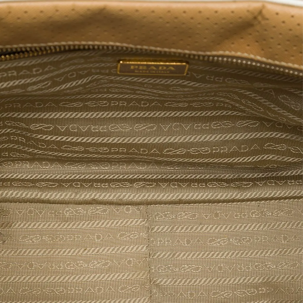 Prada Perforated Saffiano Lux Bauletto Top Handle Bag Brown Leather Good - Model View