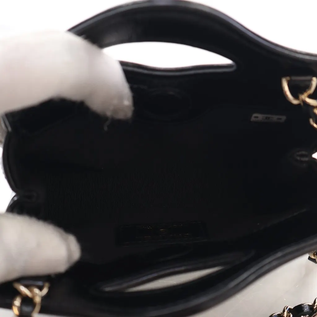 Chanel Micro Shiny Lambskin 31 Clutch with Chain Black Leather Never worn - Model View