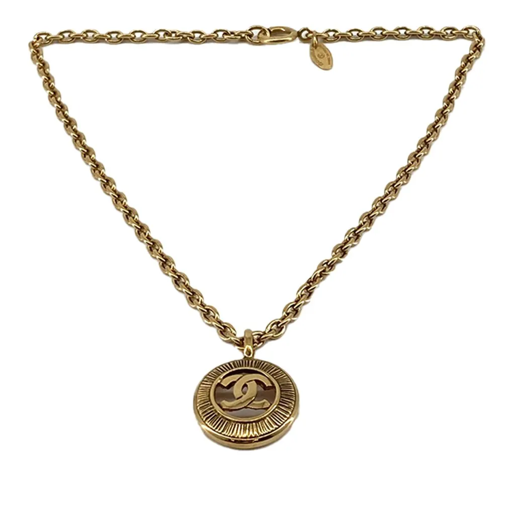 Chanel CC Gold Plated Medallion Sunburst Pendant Necklace