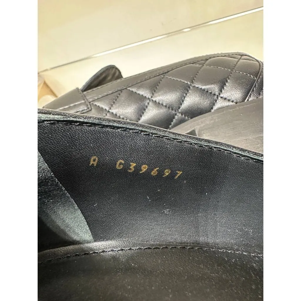 Chanel 23C Paris–Monte Carlo Quilted CC Heart Loafers Sz.39 Pre-owned Black Leather Good - Model View