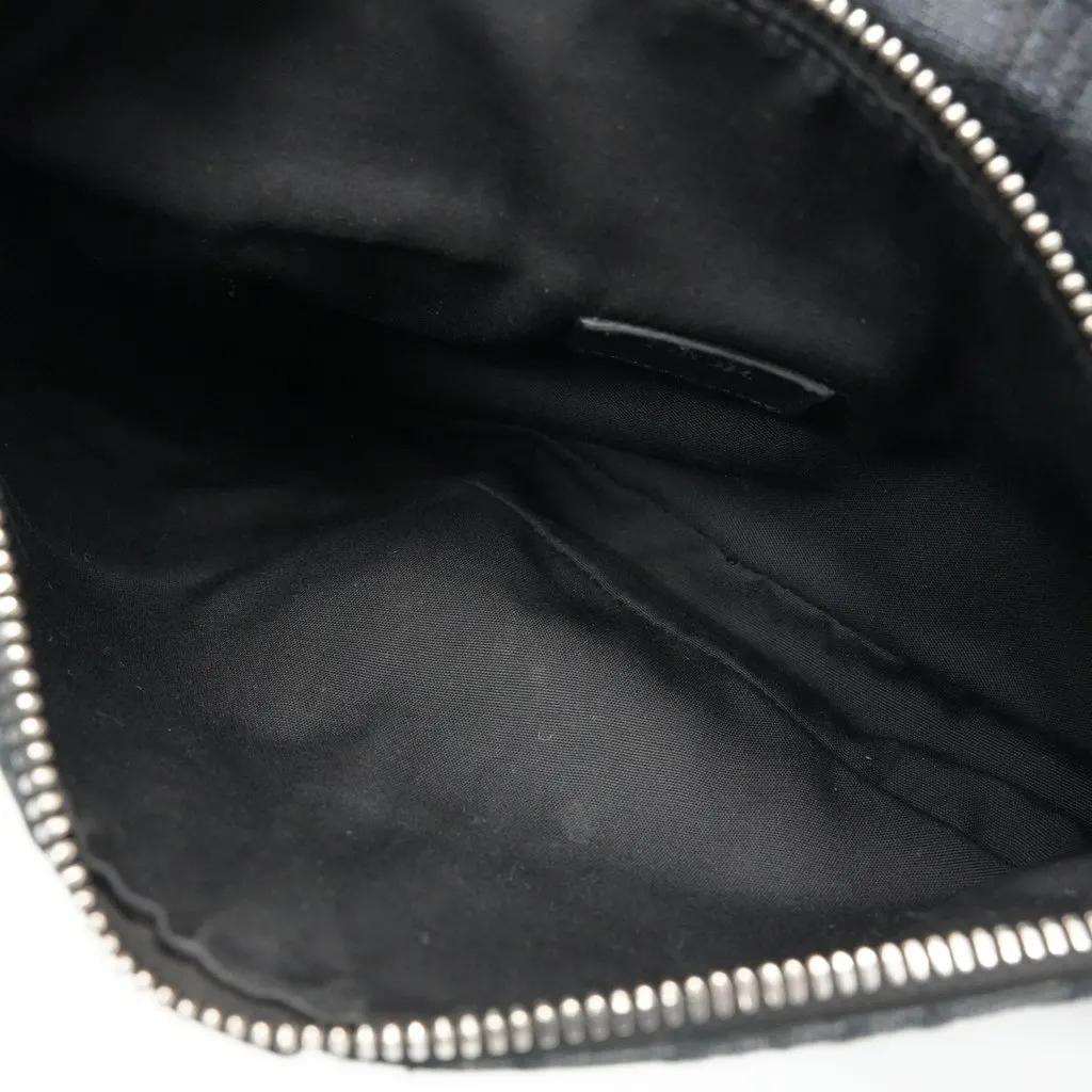 Dior Dior Saddle Bag in Black Dior Oblique Jacquard Black Canvas Fair - Model View