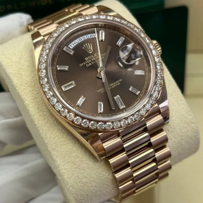 Rolex Everose Gold Day-Date 40 Watch - Everose Gold Bezel - Chocolate Baguette Diamond Dial - President Bracelet Pink Never worn - Model View