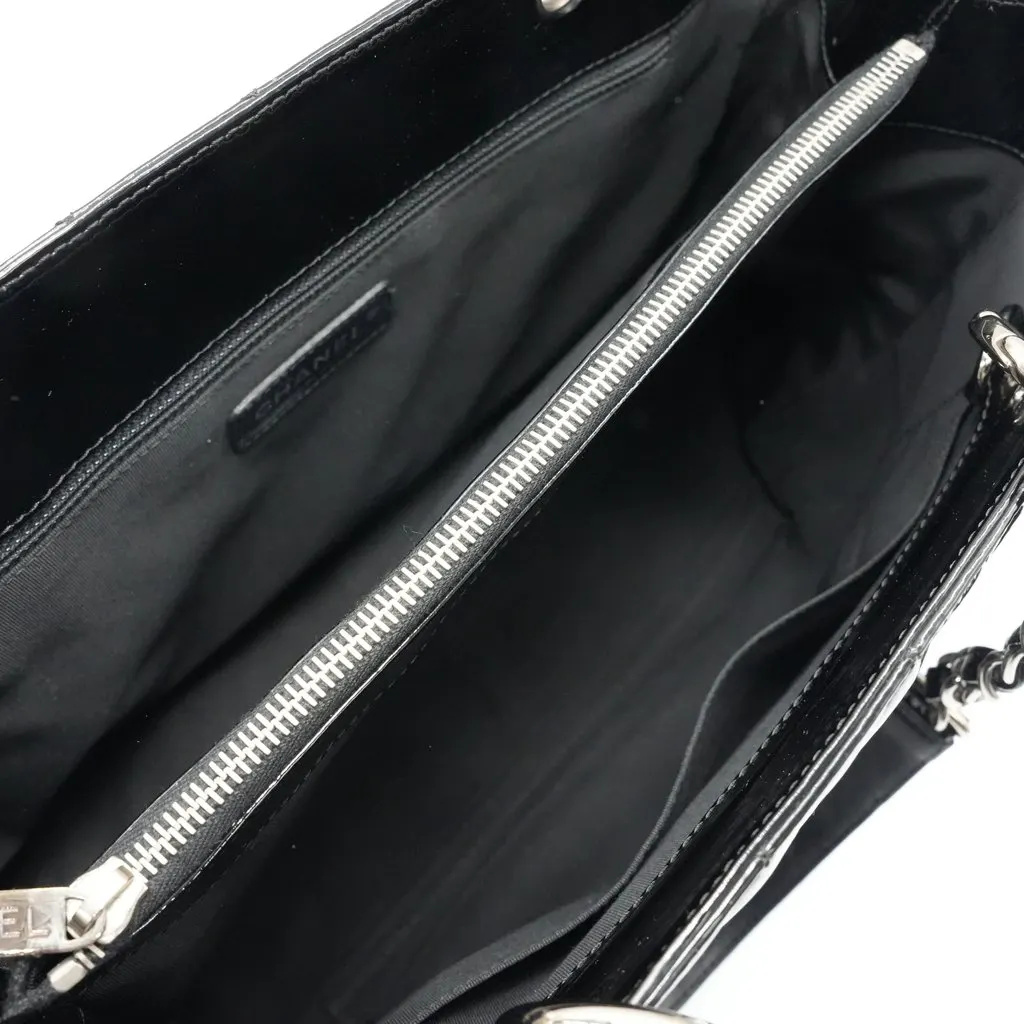 Chanel Grand Shopping Tote Patent Black Leather Good - Model View
