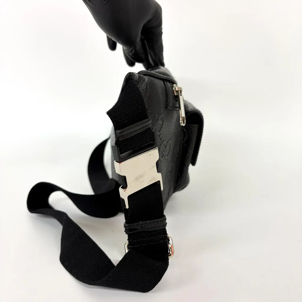 Gucci GG Embossed Belt Bag Black Black Leather Fair - Model View