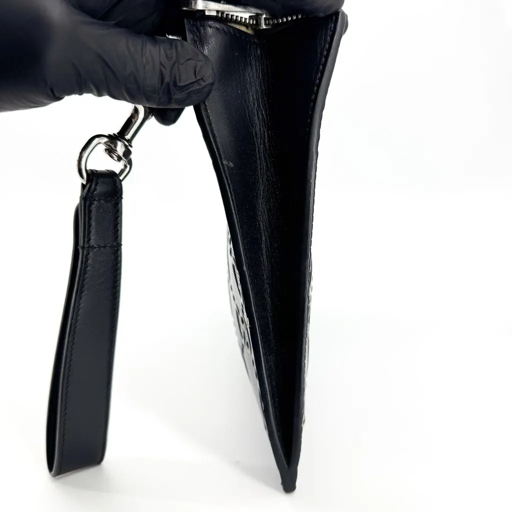 Gucci GG Embossed Pouch Black Black Leather Good - Model View