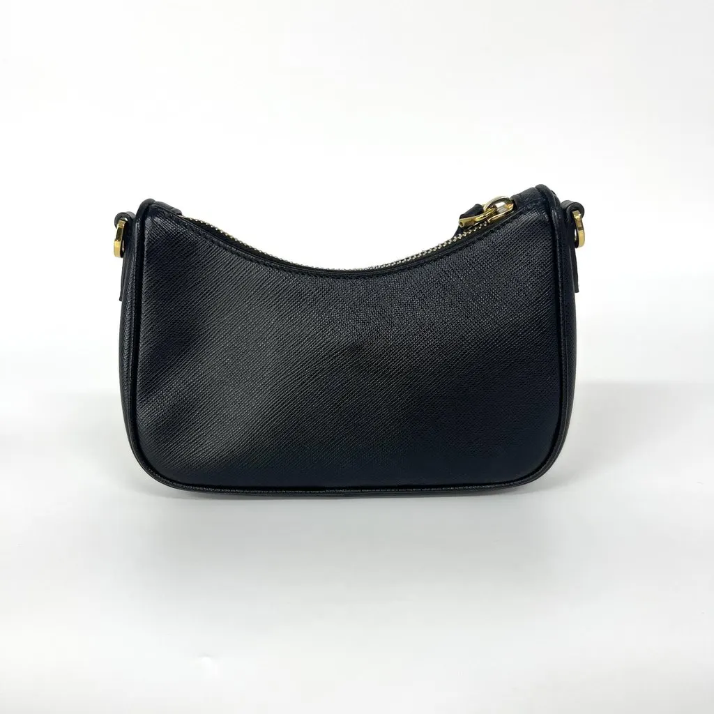 Prada Saffiano leather mini bag in black with gold hardware Black Leather Very good - Inside View