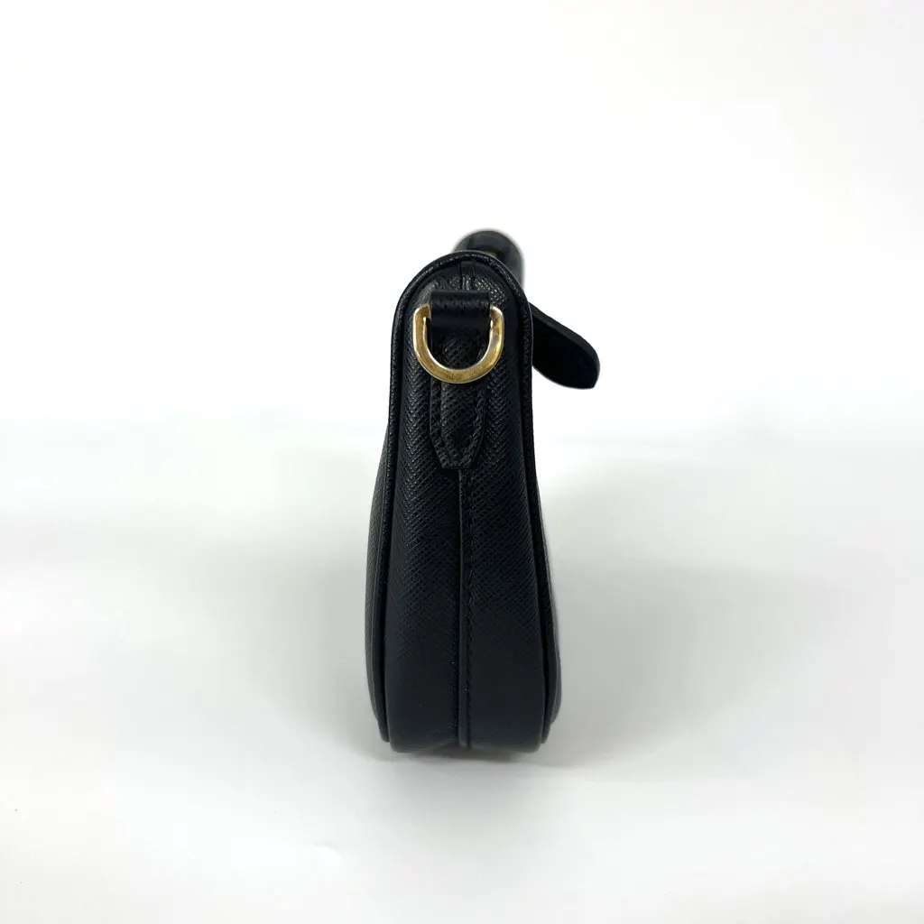 Prada Saffiano leather mini bag in black with gold hardware Black Leather Very good - Model View