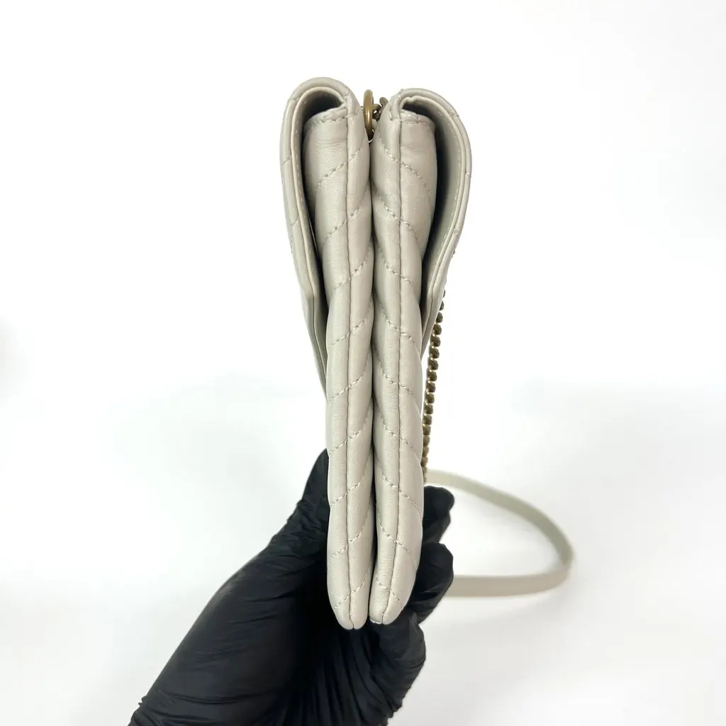 Saint Laurent Monogram Matelassé Phone Holder Shoulder Bag Blanc Vintage Gold Hardware Ecru Leather Good - Model View