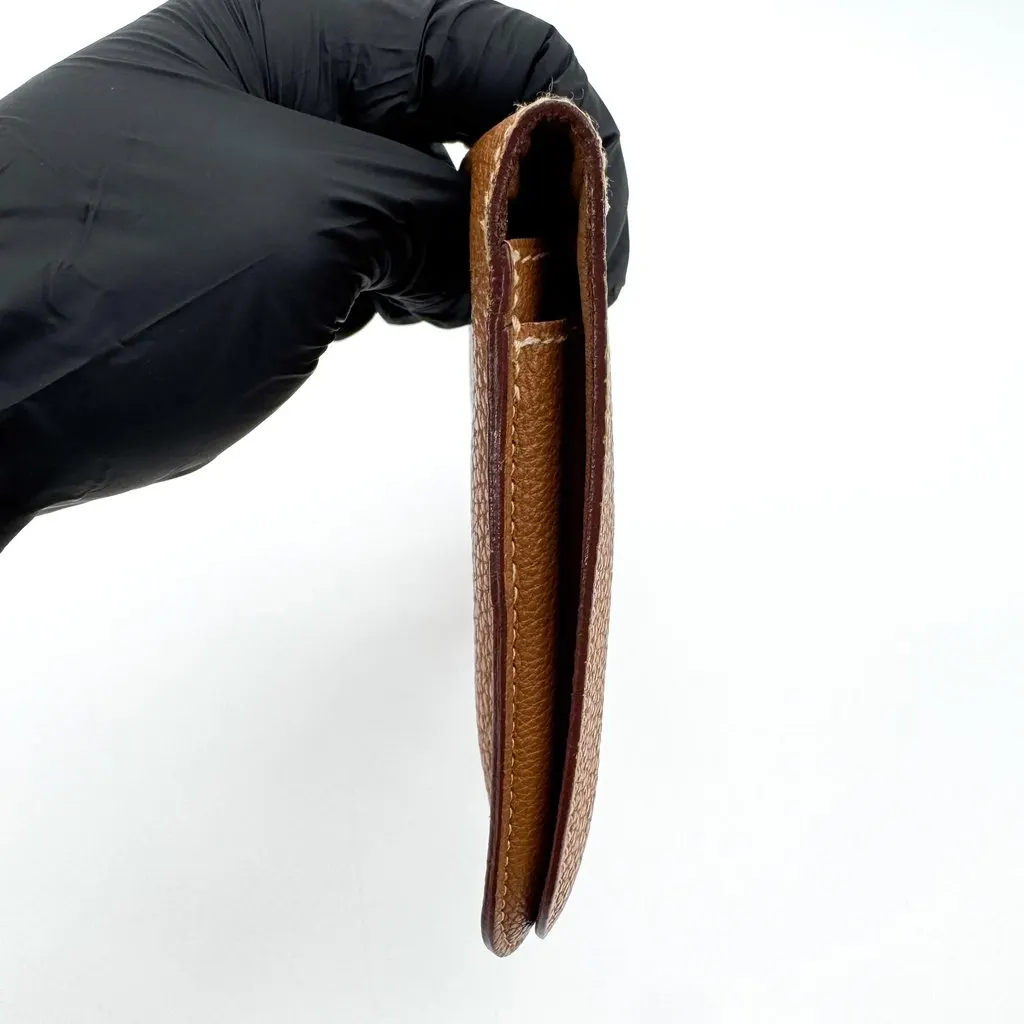 Hermès Dogon Duo Wallet Togo Gold GHW Brown Leather Good - Model View