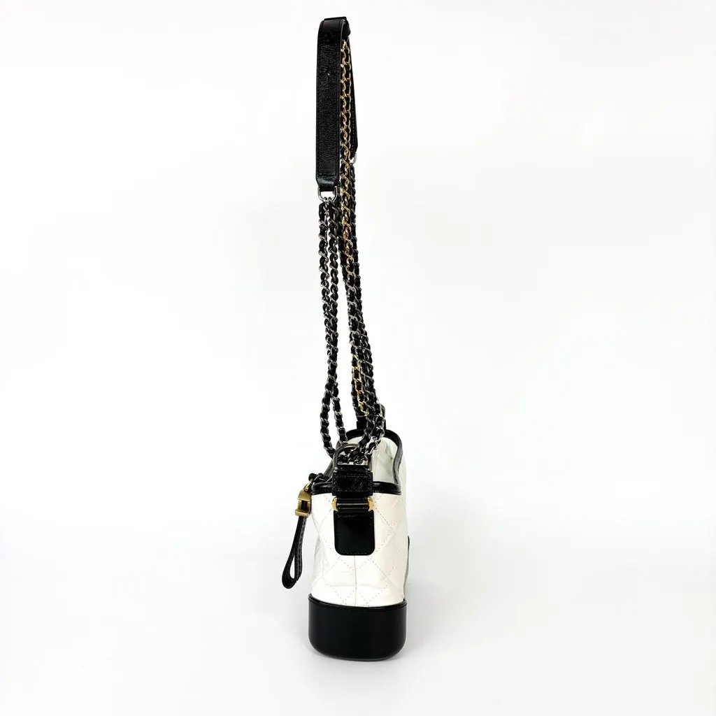 Chanel Gabrielle Small Hobo Bag White and Black 23 Series Black Leather Good - Model View