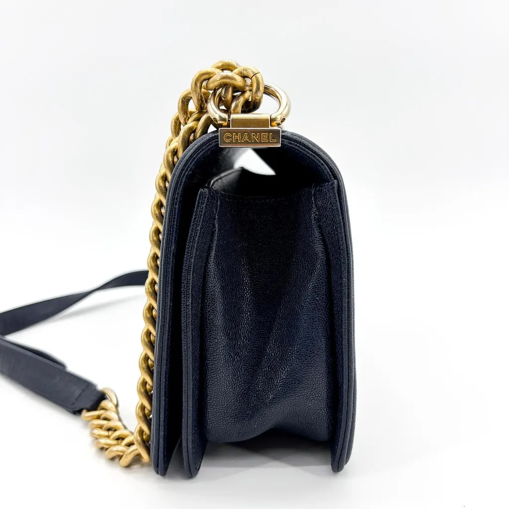Chanel Boy Chanel Flap Bag Medium Navy Caviar Vintage Gold Hardware Navy Leather Good - Model View