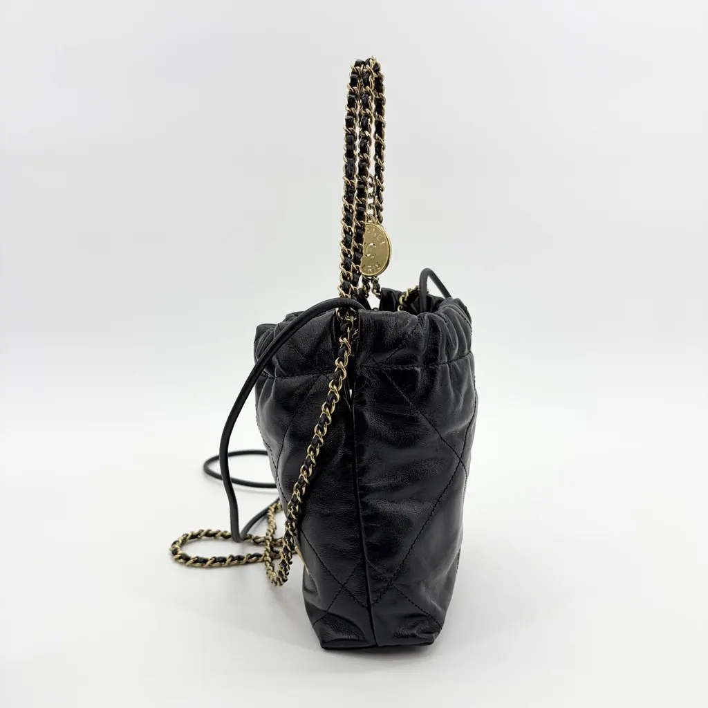 Chanel 22 Mini Handbag Black Glossy Calfskin Gold Hardware Black Leather Very good - Model View