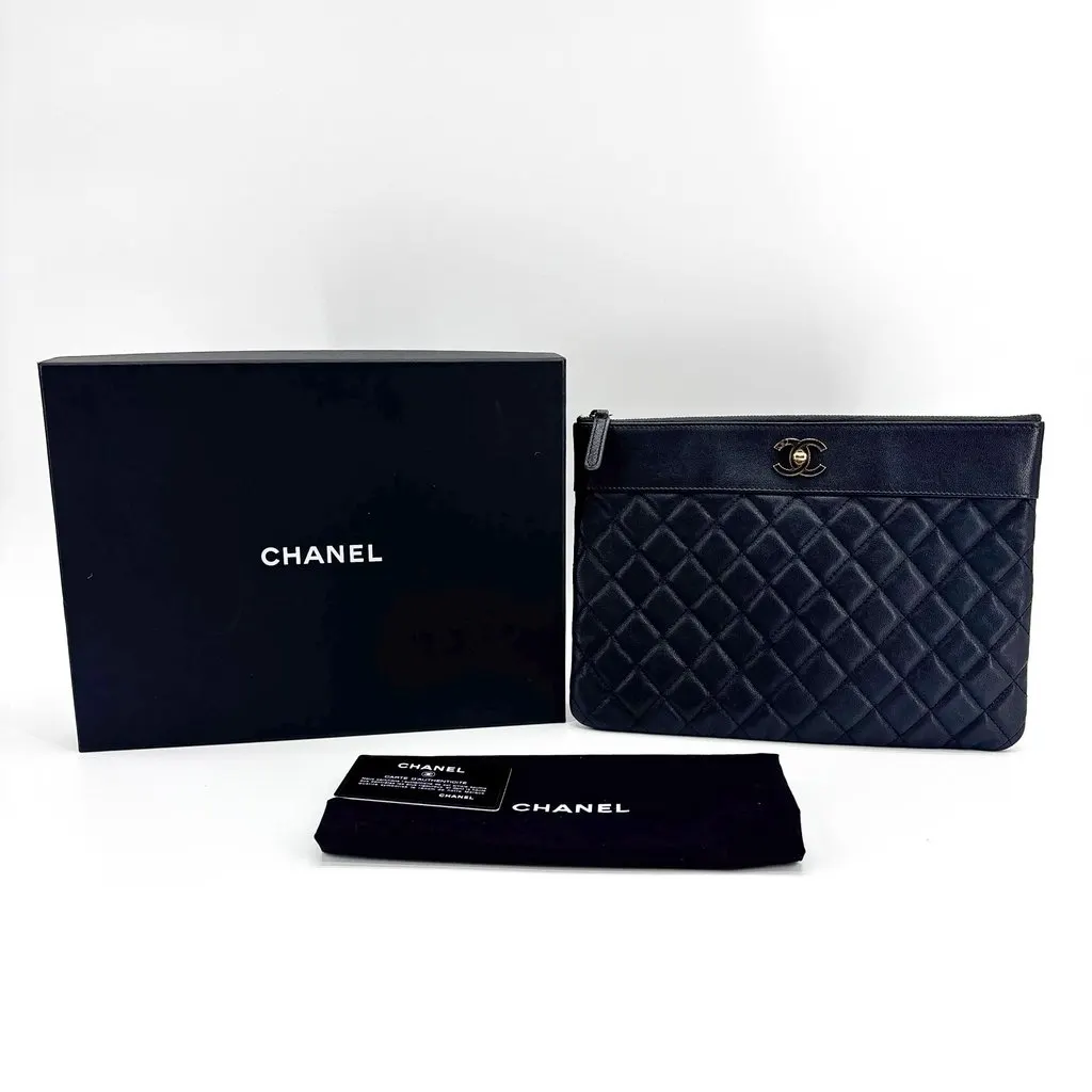 Chanel CC Turn-Lock Quilted O-Case Clutch Bag Navy Gold Hardware Gold Leather Very good - Back View