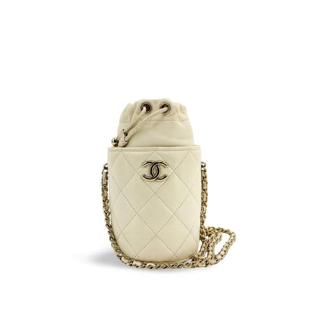 Chanel Lambskin Quilted Mini Drawstring Bucket Bag Ivory Gold Hardware Gold Leather Good - Front View