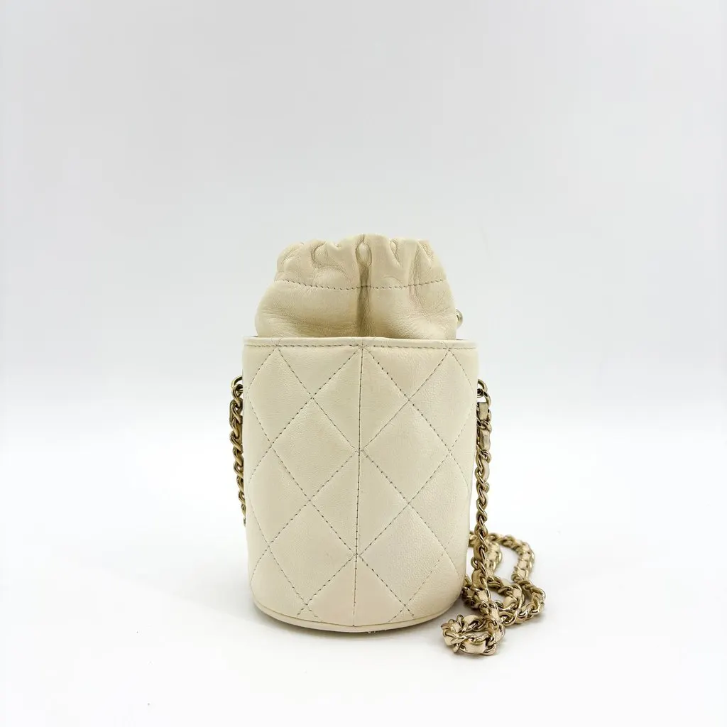 Chanel Lambskin Quilted Mini Drawstring Bucket Bag Ivory Gold Hardware Gold Leather Good - Inside View