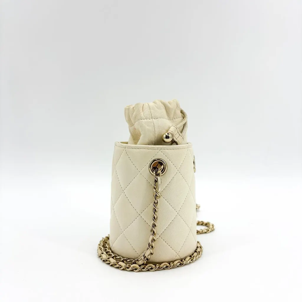 Chanel Lambskin Quilted Mini Drawstring Bucket Bag Ivory Gold Hardware Gold Leather Good - Box View