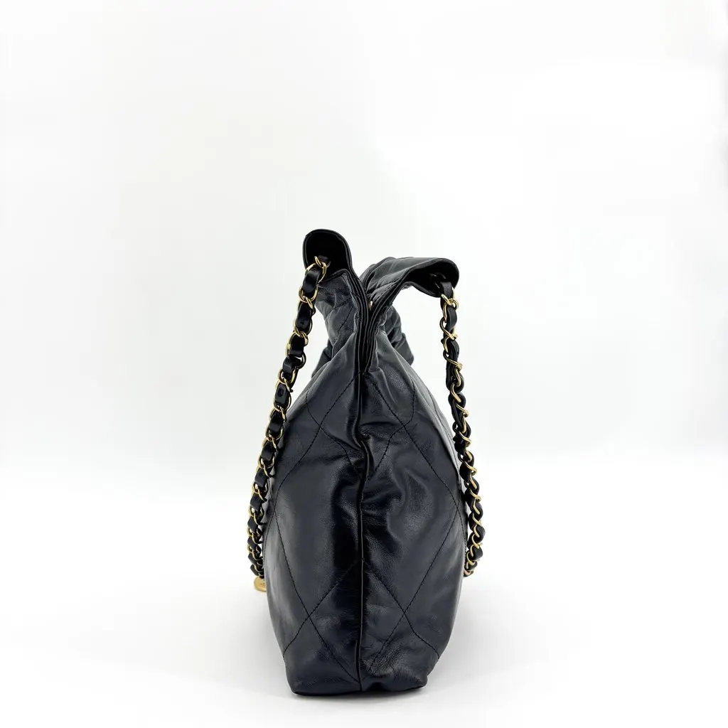 Chanel 22 Mini Bag Black Gold Black Leather Good - Model View