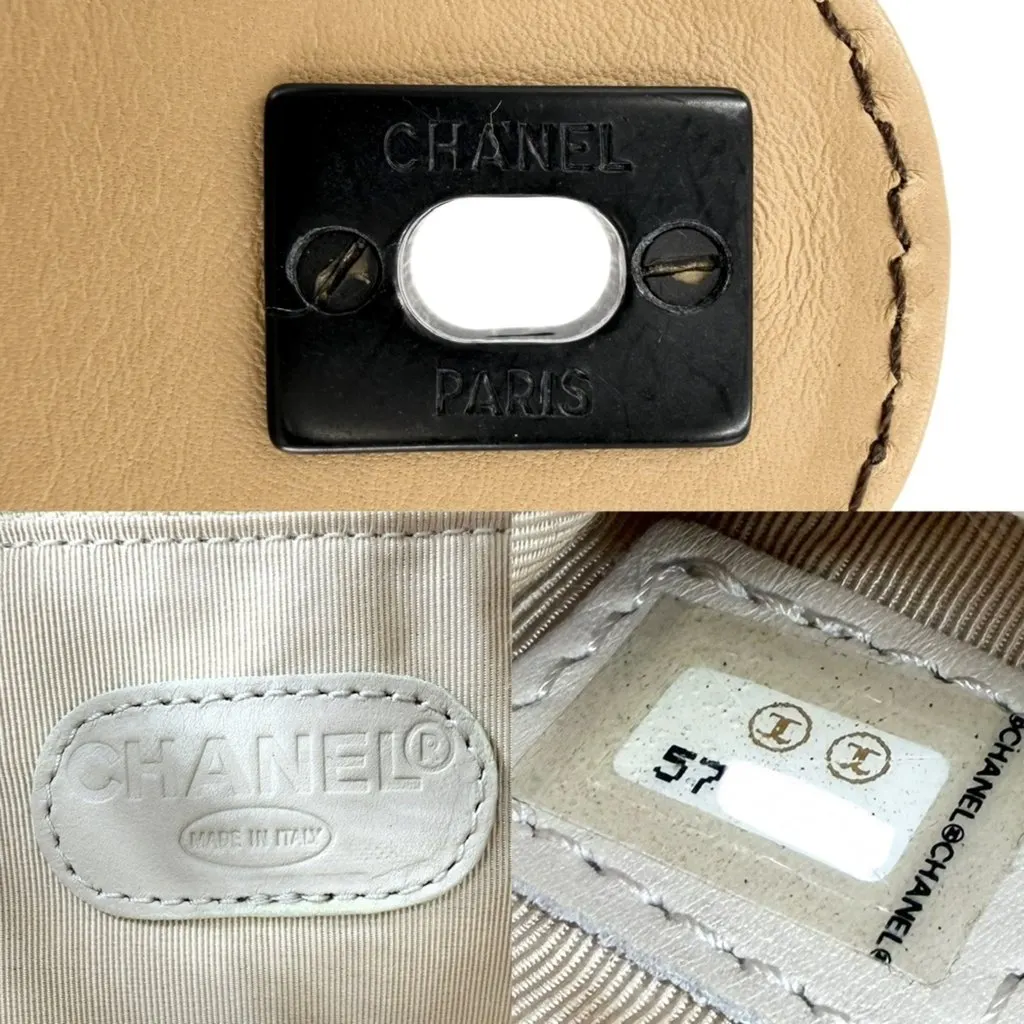 Chanel women's backpack with Coco Mark design, leather, brown, black hardware. Brown Leather Good - Box View