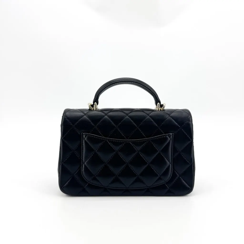 Chanel Classic Mini Flap Bag with Top Handle Lambskin Gold Hardware Black Black Leather Very good - Inside View