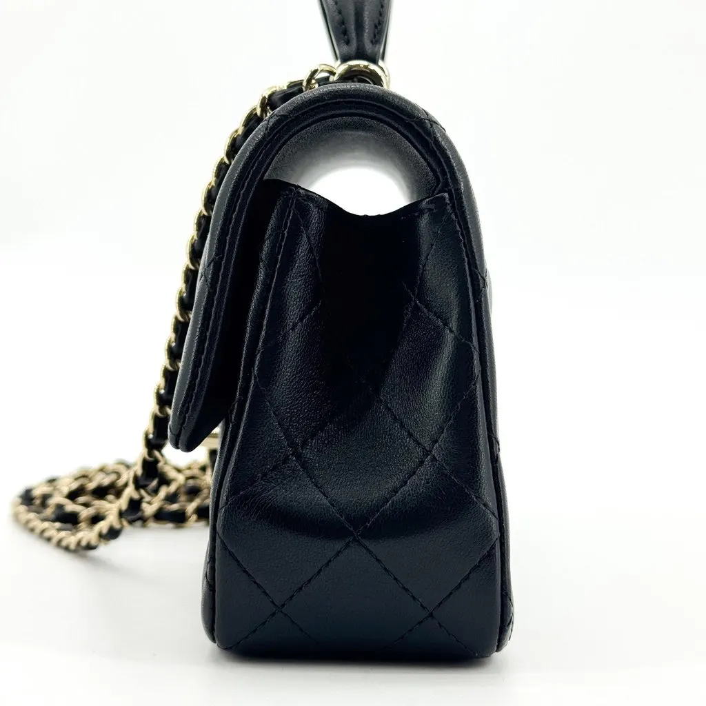 Chanel Classic Mini Flap Bag with Top Handle Lambskin Gold Hardware Black Black Leather Very good - Model View