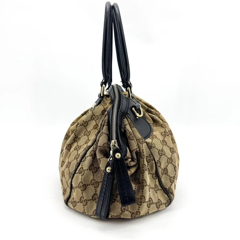 Gucci GG Canvas Sukey Medium Top Handle Bag Brown Black Beige Canvas Fair - Model View