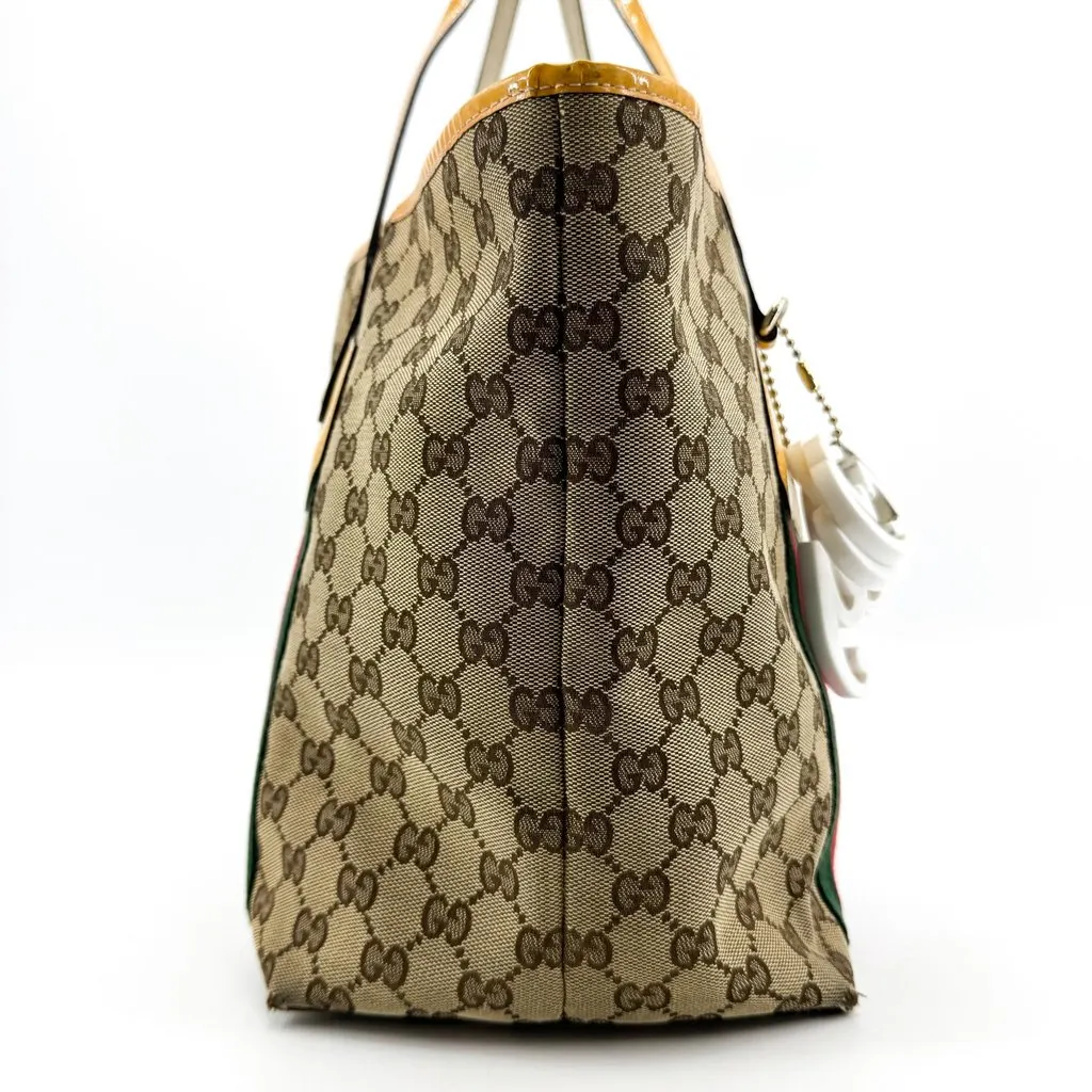 Gucci GG Canvas Web Jolie Patent Leather Tote Bag Beige Yellow Beige Canvas Fair - Model View