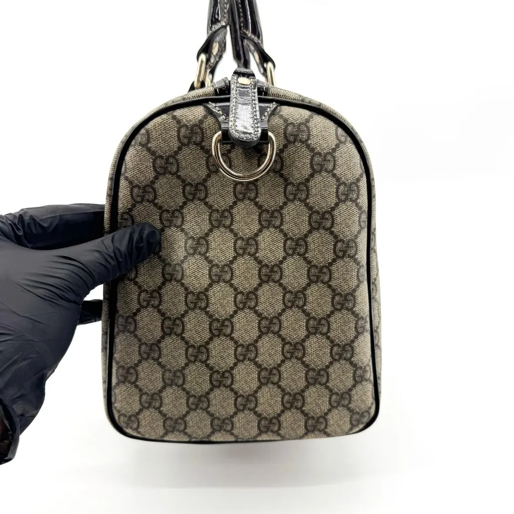 Gucci GG Supreme Joy Medium Boston Bag Black Beige Canvas Good - Model View