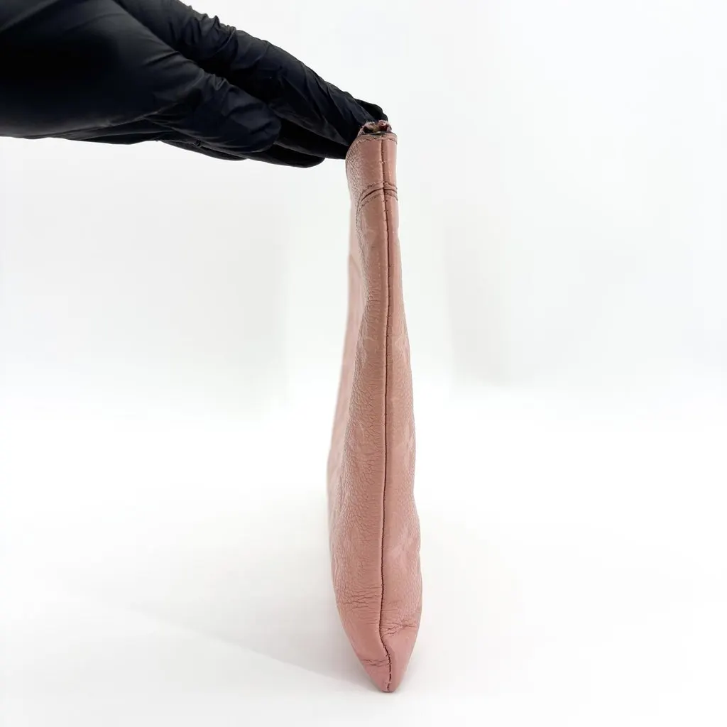 Louis Vuitton Daily Pouch Monogram Empreinte Rose Poudre Pink Leather Good - Model View