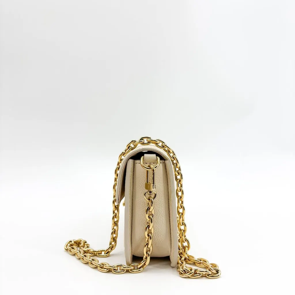 Louis Vuitton Lily Wallet on Chain Monogram Empreinte Creme Beige Leather Very good - Model View
