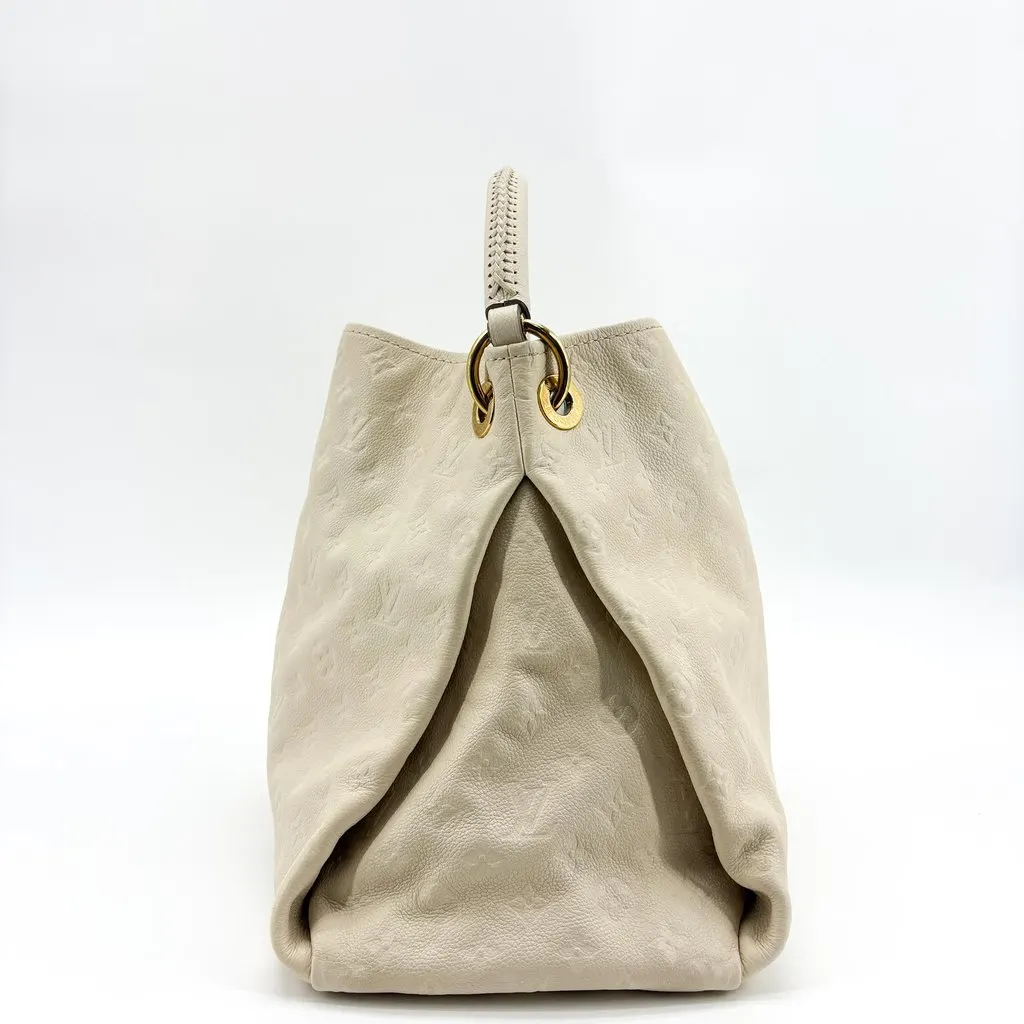 Louis Vuitton Artsy MM Monogram Empreinte Beige Beige Leather Good - Model View