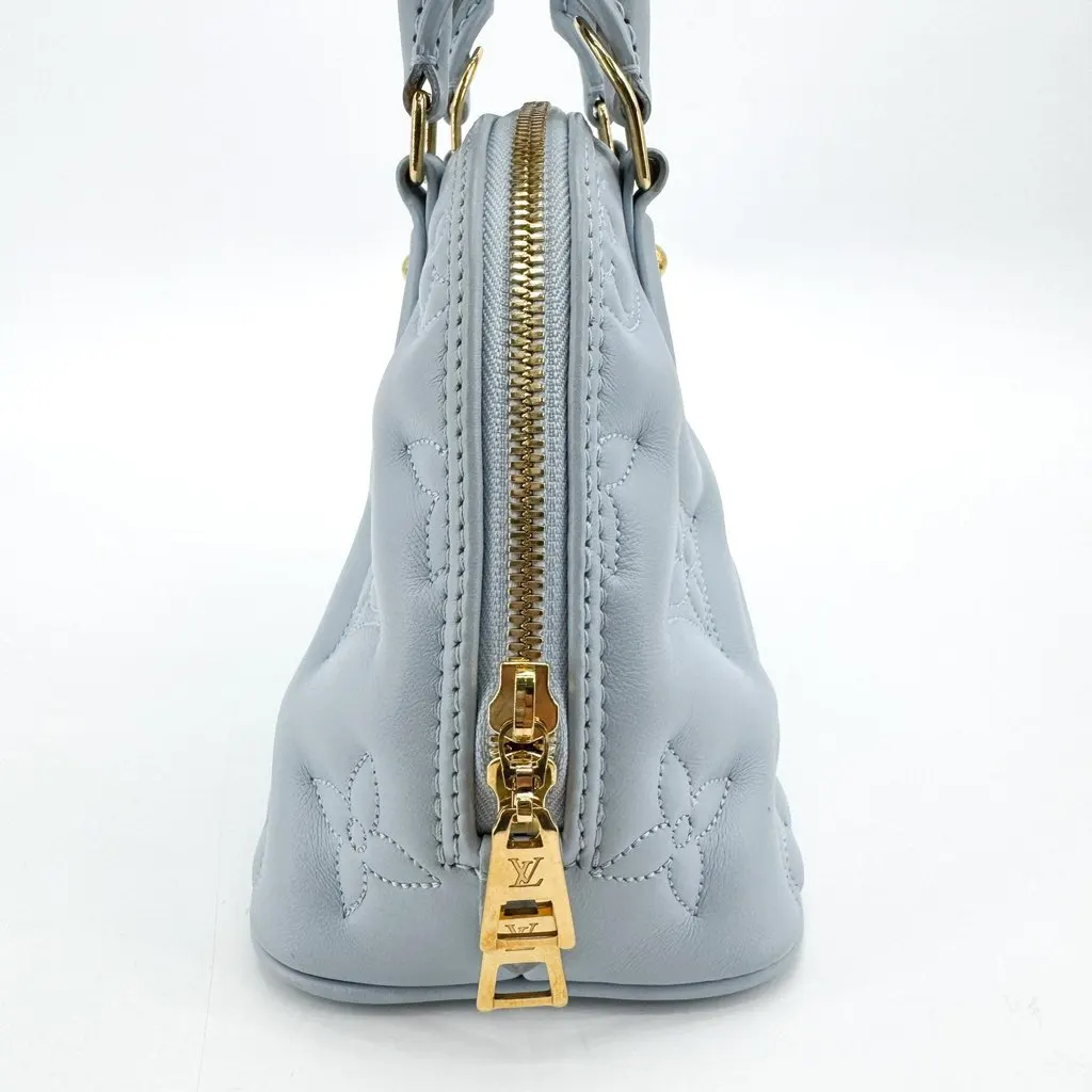 Louis Vuitton Bubblegram Alma BB Glacier Blue Blue Leather Good - Model View