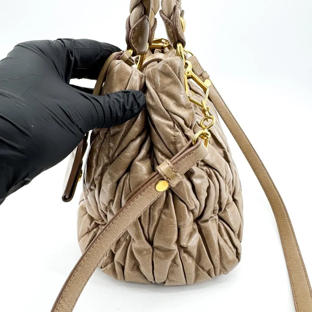 Miu Miu Matelasse Cloquet Nappa Leather Top Handle Bag Brown Beige Leather Good - Model View