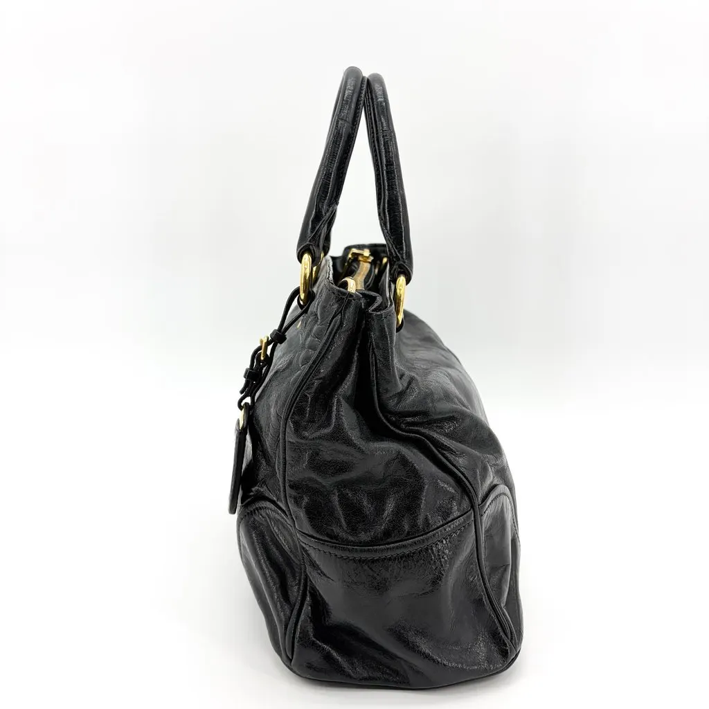 Prada Vitello Shine Tote Bag Black with Gold Hardware Black Leather Good - Model View